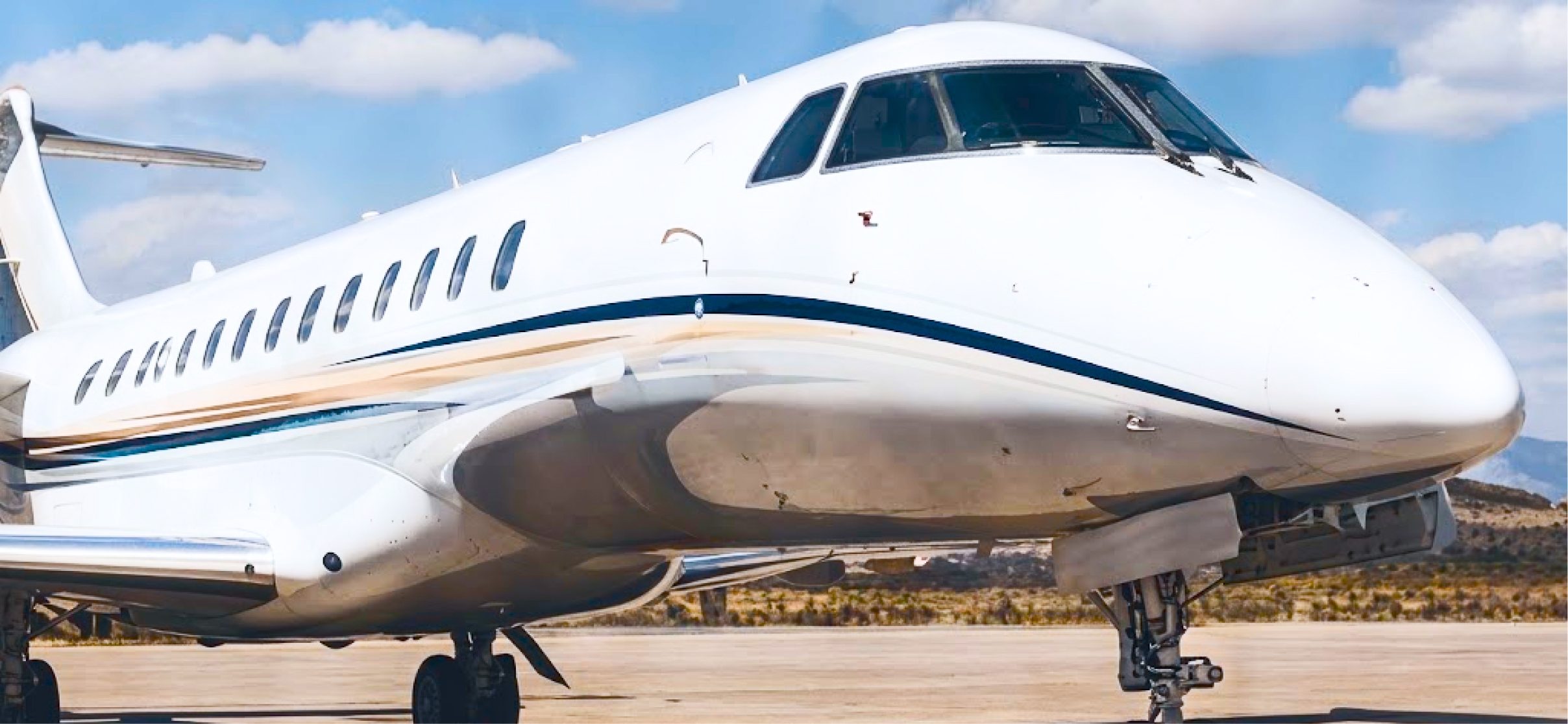 Business jet parked on the apron